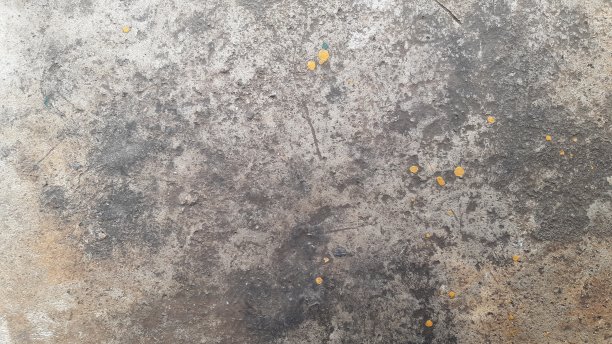 黄金或箔画在垃圾混凝土和水泥脏。图片下载