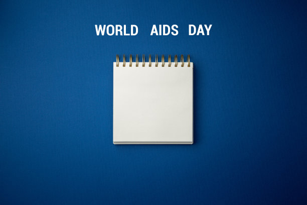 螺旋式记事本世界艾滋病日概念。图片下载