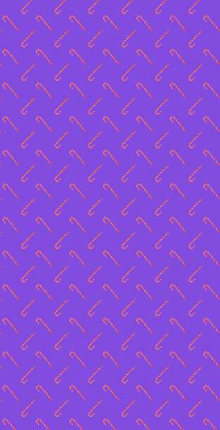 传统的圣诞糖果手杖在紫罗兰的背景图片下载