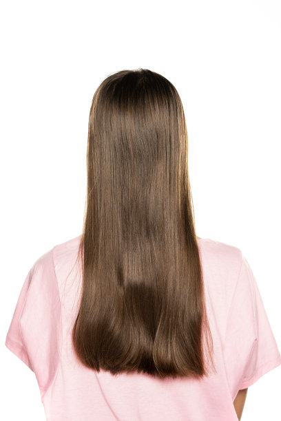 后视图的年轻女子与长头发图片下载