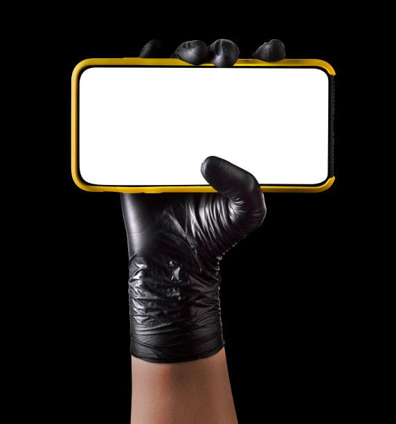 手握黑色手套的手机与空白屏幕隔离在黑色图片下载