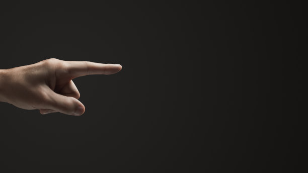 手形指针。黑暗的背景。副本的空间。图片下载