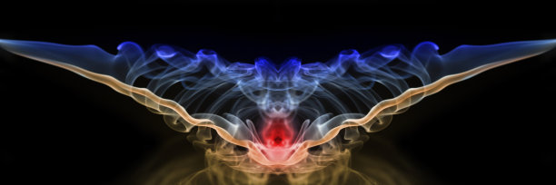 彩色抽象烟雾漩涡的黑色背景图片下载