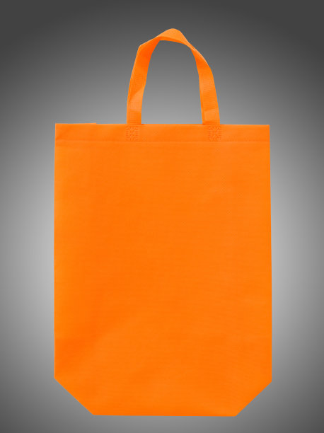 橙色布制购物袋孤立的白色背景图片下载