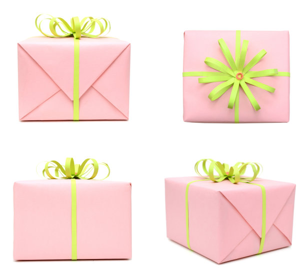 一个粉红色的礼品盒，上面有绿色的纸蝴蝶结图片下载