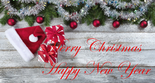 圣诞或新年假期背景上的白色老化木材与文字图片下载