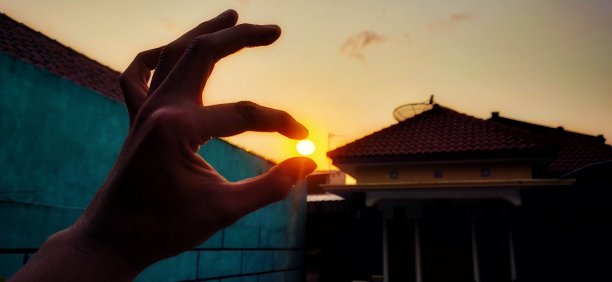 掐住午后的夕阳图片下载