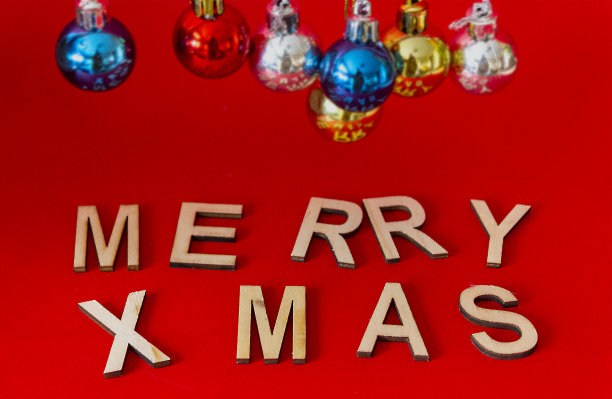 圣诞作文与文字圣诞快乐在红色的背景图片下载