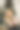 圣诞节时尚照片美丽的女孩与金发在舒适的衣服摆pose在圣诞树与礼物盒。新年快乐理念。图片下载