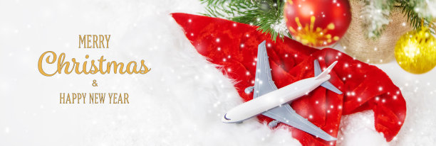 美丽的圣诞背景与飞机。圣诞节和新年的旅游概念。有选择性的重点。假期。图片下载