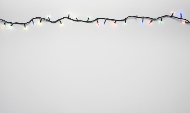 圣诞灯在白色的背景与拷贝空间图片下载