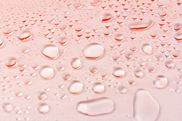 水滴纹理背景。水滴。红色的。有选择性的重点。图片下载