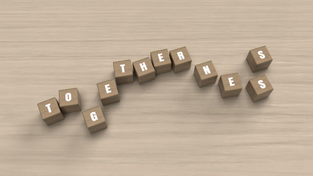 三维渲染插图的立方体块显示'团聚'字图片下载