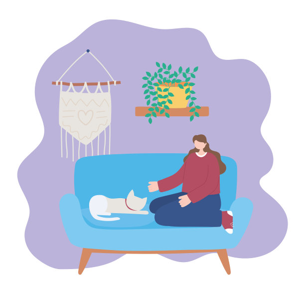 呆在家里的女孩和猫坐在沙发上图片下载