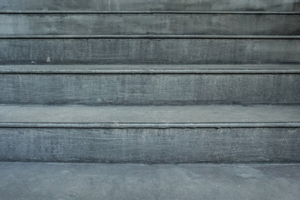 灰色混凝土步骤纹理为背景。图片下载