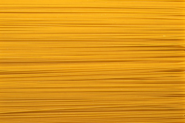 分散的生意大利面质地。糕点图案、食物背景、纹理构思。图片下载