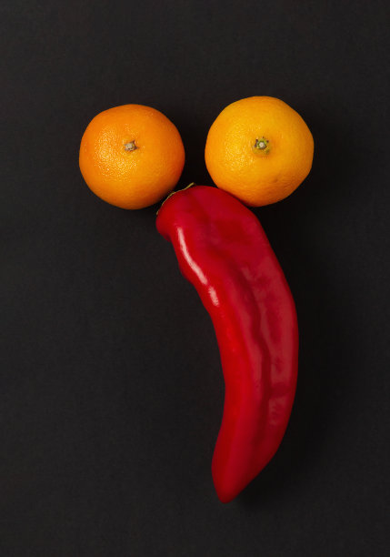 红辣椒和橘色的万圣节卡通脸图片下载