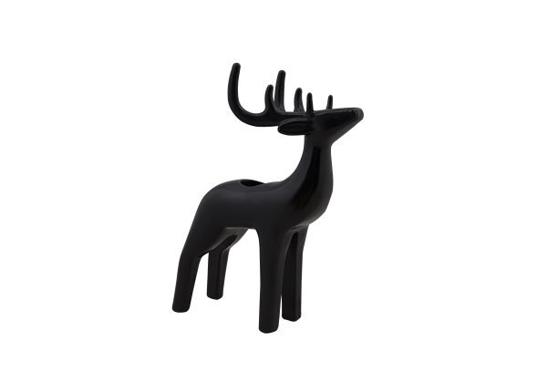 白色背景上隔离的黑色圣诞陶瓷鹿图片下载