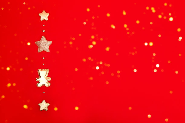 圣诞红底金装饰品，节日彩灯。图片下载