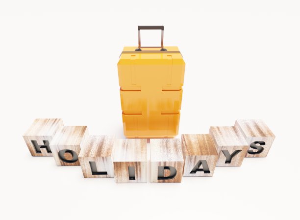 黄色手提箱与木块度假上的白色方块图片下载