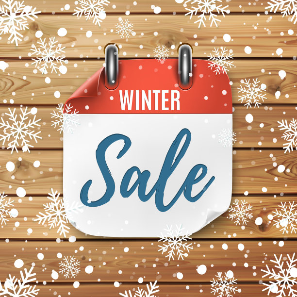 冬季销售。现实的日历图标。木制背景与雪花。图片下载