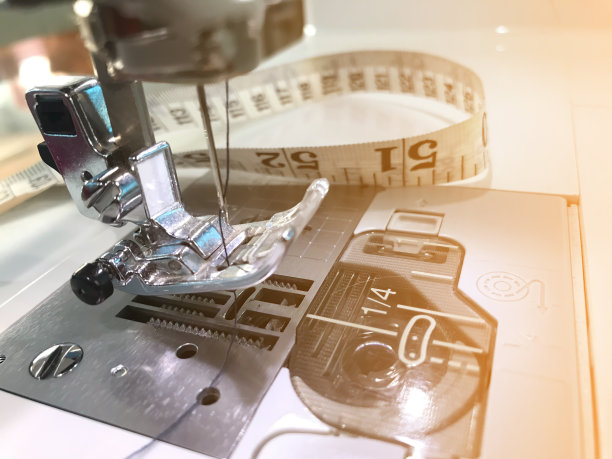 特写缝纫机图案纹理背景。图片下载