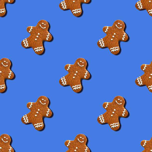 无缝图案姜饼人在黄色的背景。姜饼人模式。节日装饰。节日装饰。图片下载