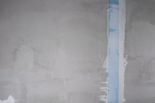 混凝土墙，用钢筋胶带加强抹灰裂缝，留有题字空间图片下载