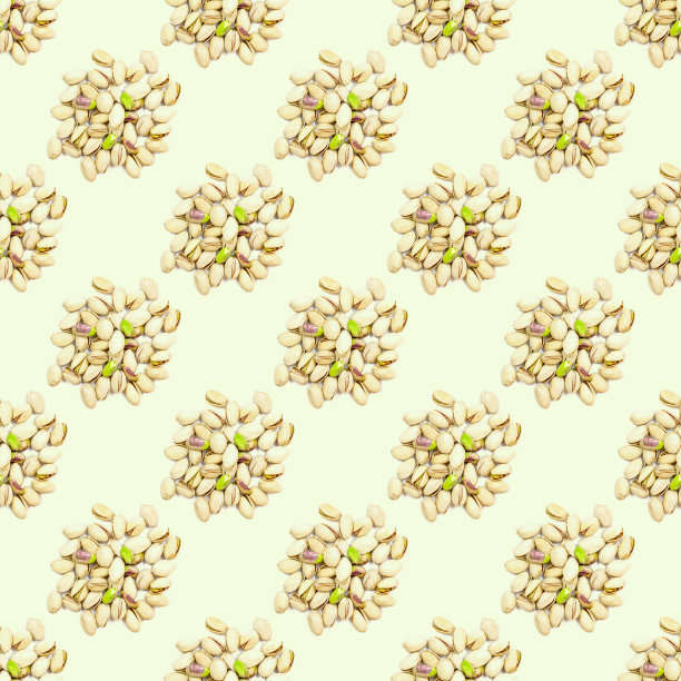 俯视图平铺开心果无缝重复图案浅米色背景图片下载