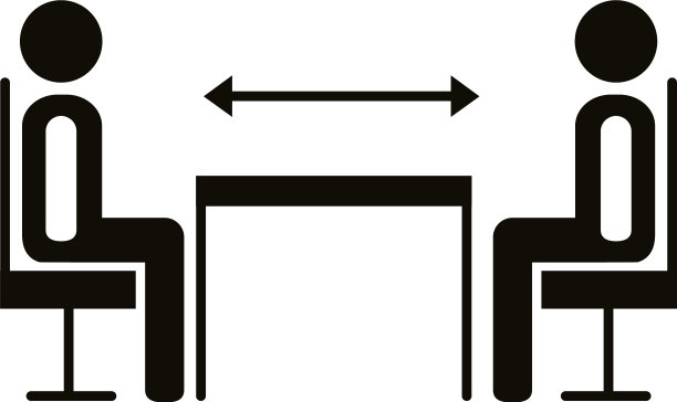 人们在餐桌上的剪影中保持距离图片下载