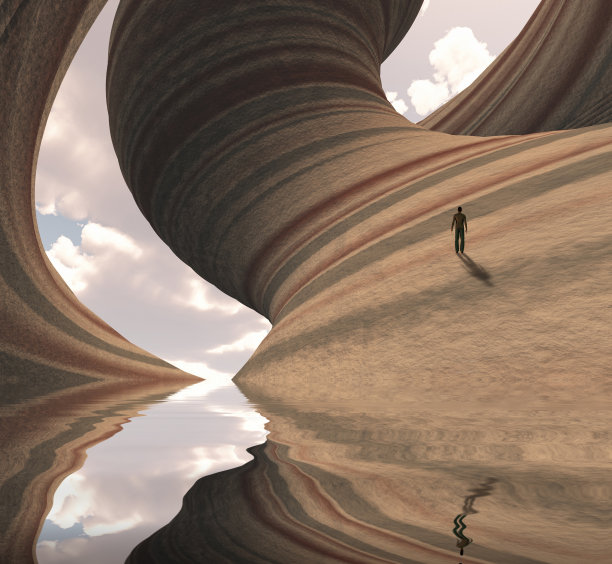 人在雕刻的峡谷岩石上图片下载