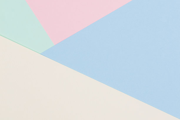 抽象彩色纸纹理背景。几何形状和线条的浅蓝色，粉色，绿色，柔和的黄色图片下载