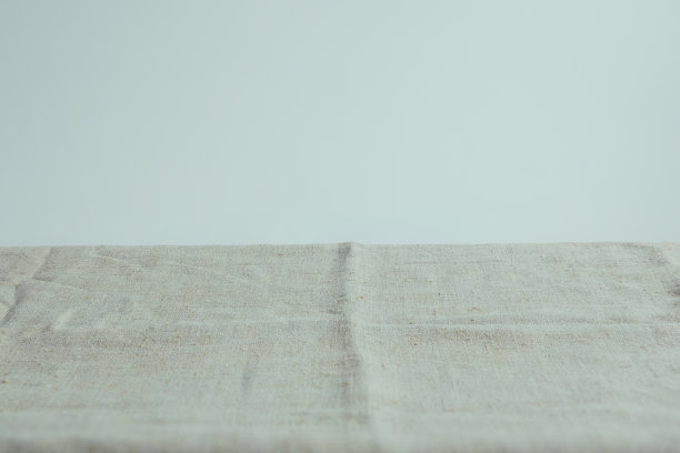 背景为米色亚麻织物，项目可以放。图片下载