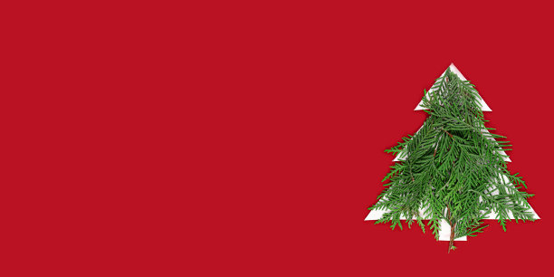 用红色背景纸剪出的圣诞树。一棵有着绿色冷杉树枝的圣诞树剪影。图片下载