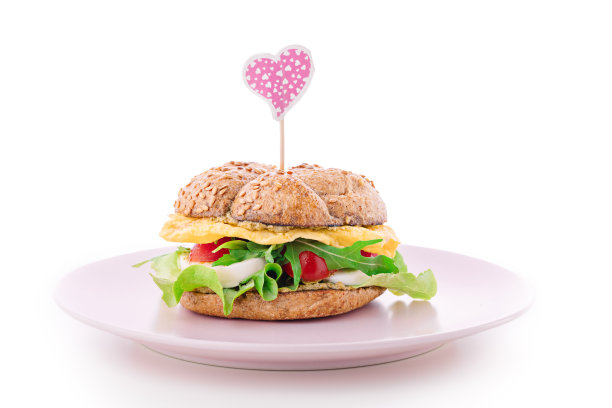 盘子上的汉堡孤立在白色背景上图片下载