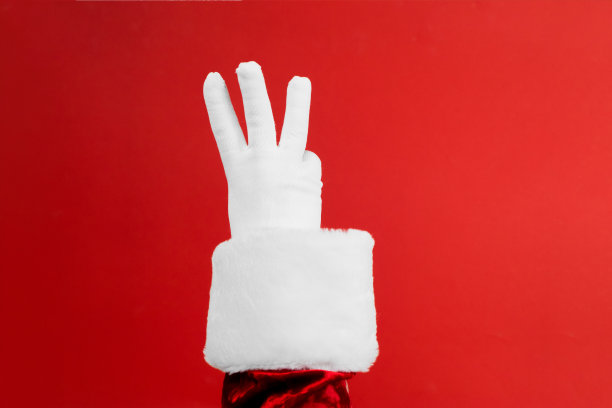 手手指教育计数集。圣诞老人戴着白手套，在红色背景上表示一到五。计算3号图片下载
