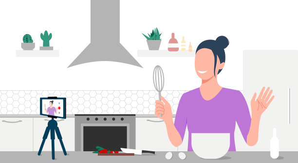 一名微笑的年轻女子在厨房里用三脚架上的智能手机摄像头做饭，并为社交网络录制现场视频。在线烹饪学校。博客,视频博客,自由。在线课程,在线学习。每股收益图片下载