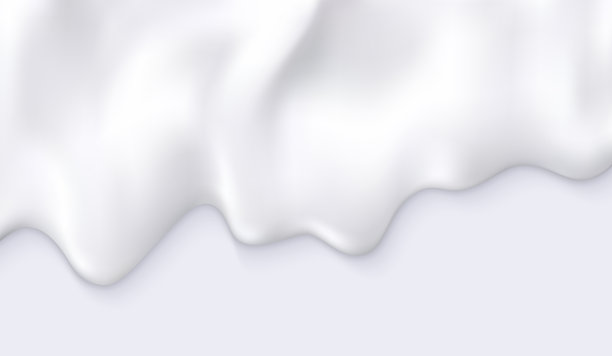 白色的奶油牛奶滴落下来。图片下载