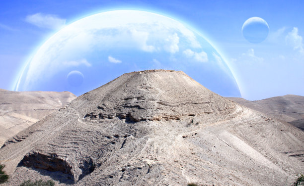 天空中有山、岩石和行星的景观图片下载