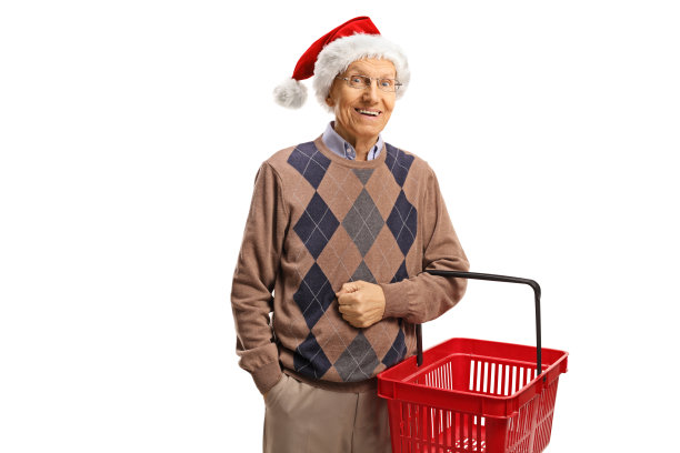 拿着购物篮和圣诞帽的老人竖起大拇指图片下载