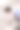 小女孩穿着粉红色的裙子在人行道上玩，旁边是白色的栅栏图片下载