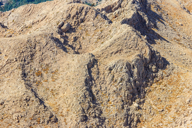 山体岩石的自然纹理为背景图片下载