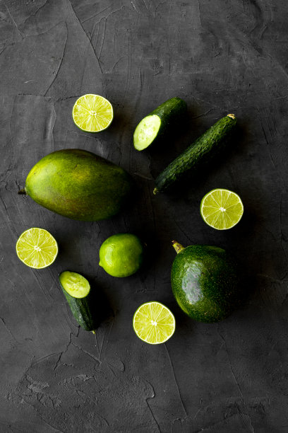 绿色蔬菜和水果背景。素食者用餐，俯视图图片下载