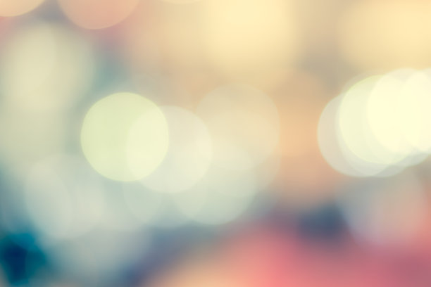 模糊抽象的背景与光散景在温暖的复古色调曼谷城市景观在晚上的风景图片下载