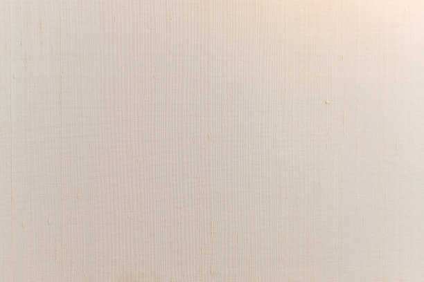 特写棕色奶油色手工丝绸天然棉，亚麻旧织物纺织布在浅白色复古颜色为抽象背景图片下载