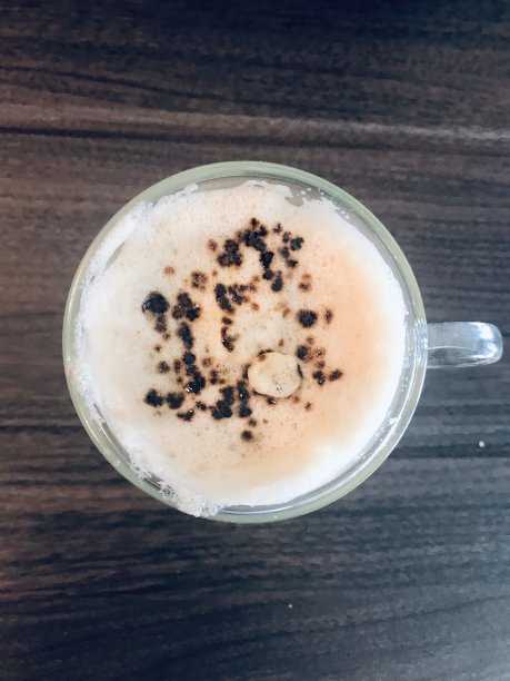 一杯加牛奶和糖的热咖啡图片下载