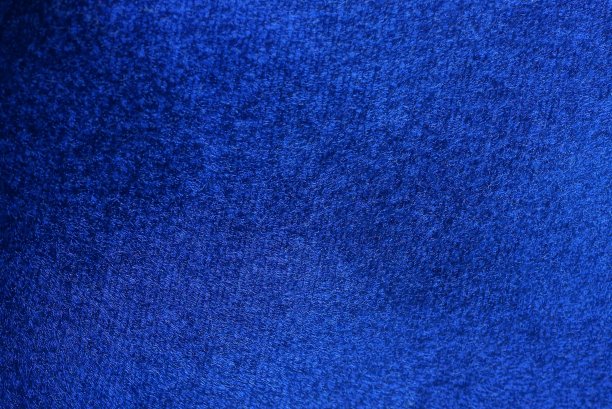 深蓝色的背景来自一块绒面革图片下载