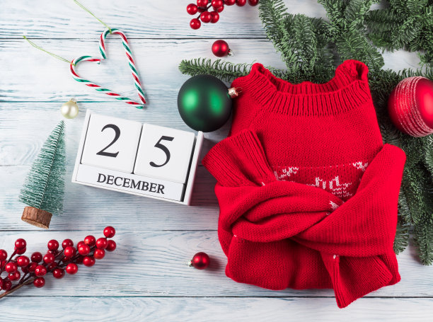 节日的圣诞平铺在木头上用日历图片下载