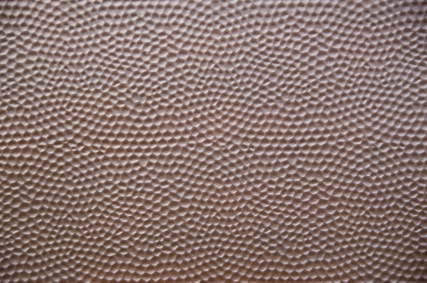 棕色金属表面与装饰六边形特写图片下载