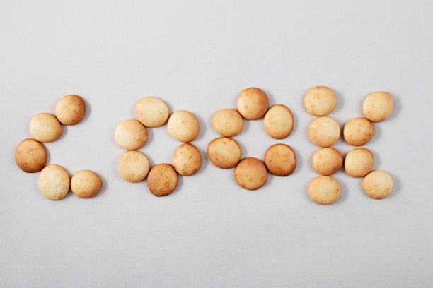 小煎饼的图案。铭厨用橘子烤圆饼。家面包店图片下载